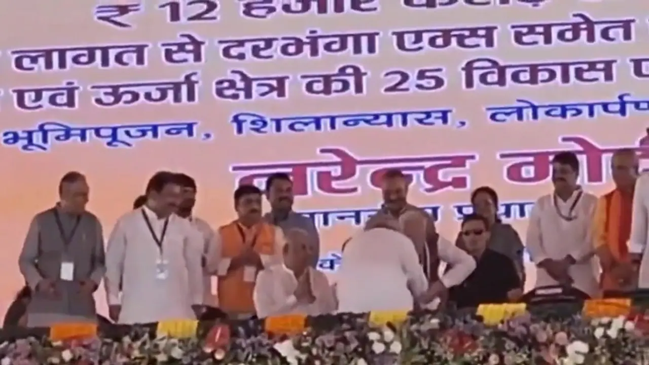 PM Modi SURPRISED as Nitish Kumar tries to touch his feet during Rs 12,100 crore project launch (WATCH) PM Modi SURPRISED as Nitish Kumar tries to touch his feet during Rs 12,100 crore project launch (WATCH)