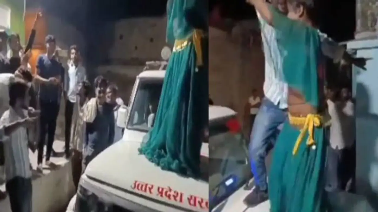 എന്തോന്നടെ ഇത്; എസ്‍ഡിഎമ്മിന്റെ വാഹനത്തിന് മുകളിൽ യുവതിയുടെ ഡാൻസ്, നോട്ടെറിഞ്ഞ് കാഴ്ച്ചക്കാർ, സംഭവം ഝാൻസിയിൽ