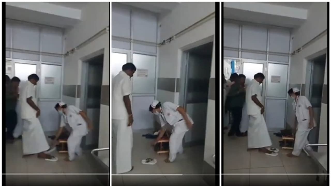 Video shows nurse carrying Congress MLA's footwear at Tamil Nadu hospital, sparks outrage (WATCH) Video shows nurse carrying Congress MLA's footwear at Tamil Nadu hospital, sparks outrage (WATCH)