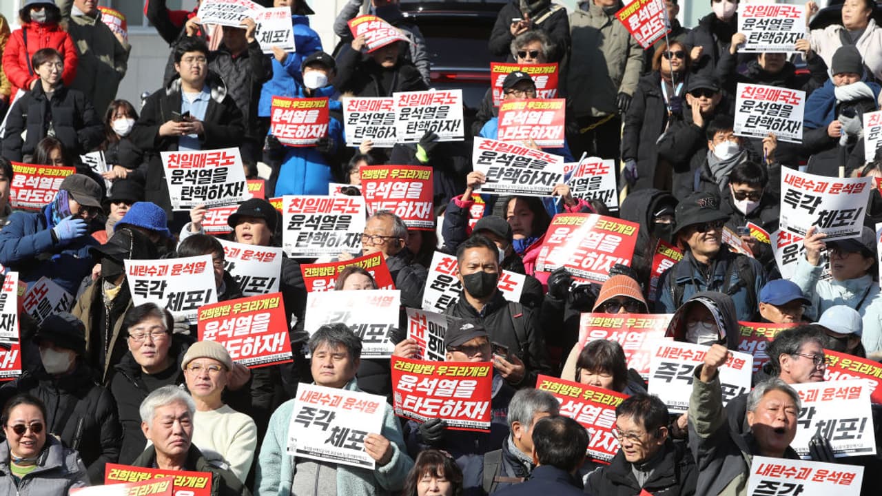 South Korean opposition lawmakers move to impeach President Yoon over short lived martial law