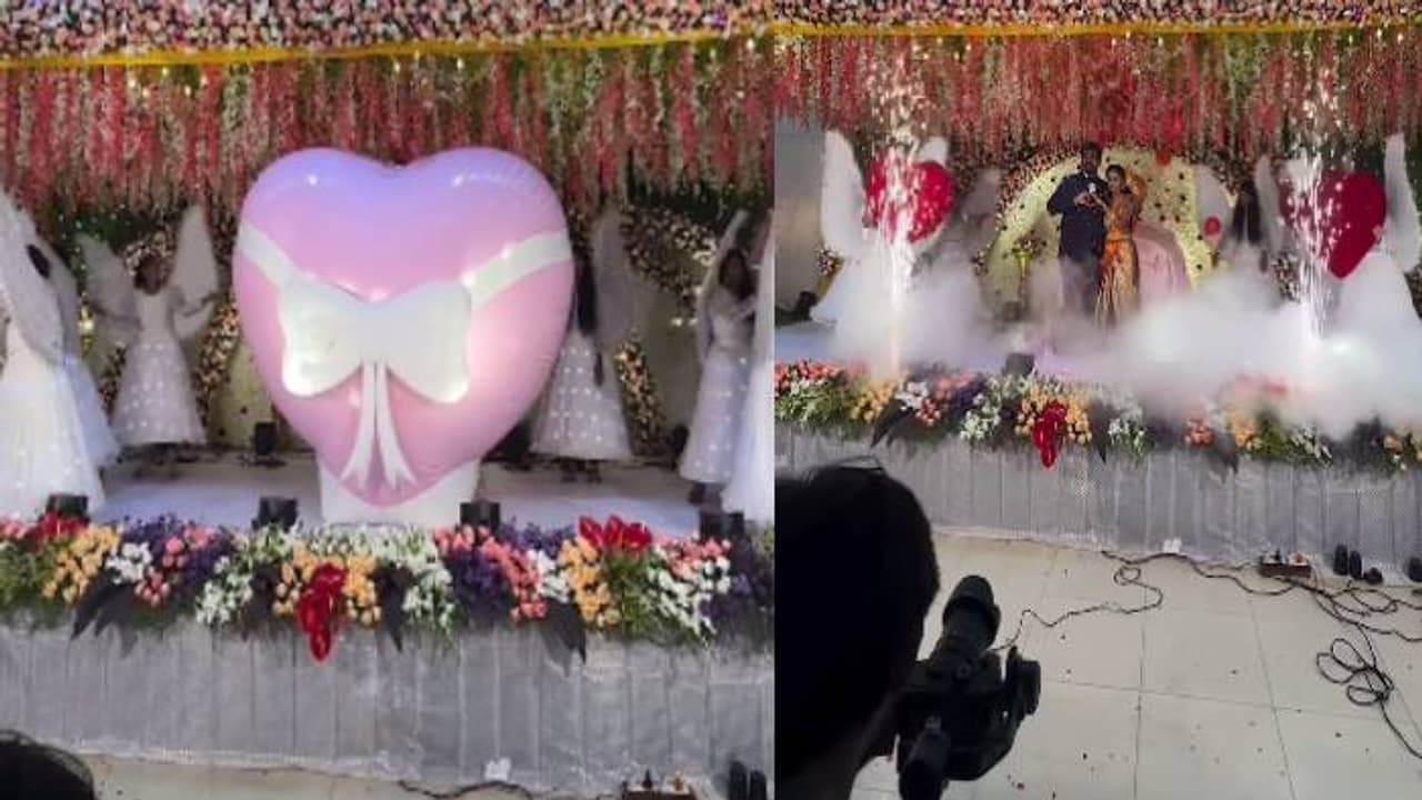 ഓരോരോ ട്രെൻഡുകൾ; വിവാഹവേദിയിൽ നവദമ്പതികൾ എത്തിയത് ബലൂൺ പൊട്ടിത്തെറിച്ച് ഓരോരോ ട്രെൻഡുകൾ; വിവാഹവേദിയിൽ നവദമ്പതികൾ എത്തിയത് ബലൂൺ പൊട്ടിത്തെറിച്ച്