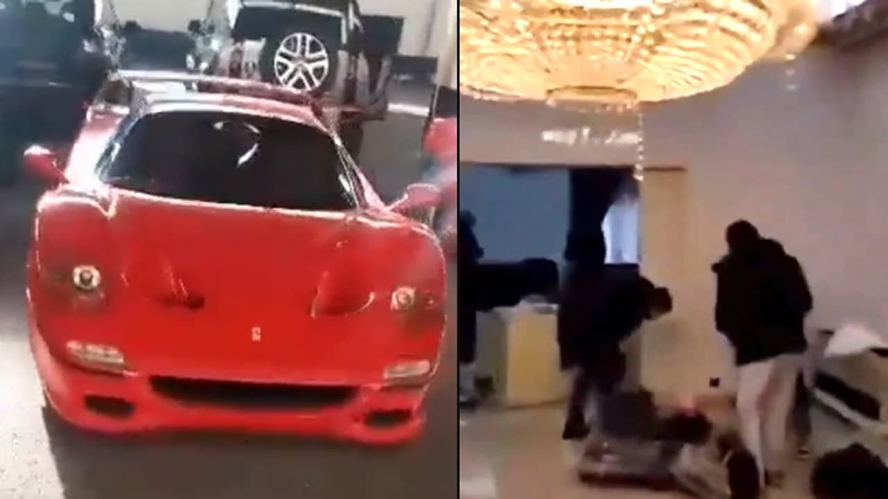 Syrian rebels raid Assad's palace; loot clothes, Louis Vuitton trunk and cars (WATCH)
