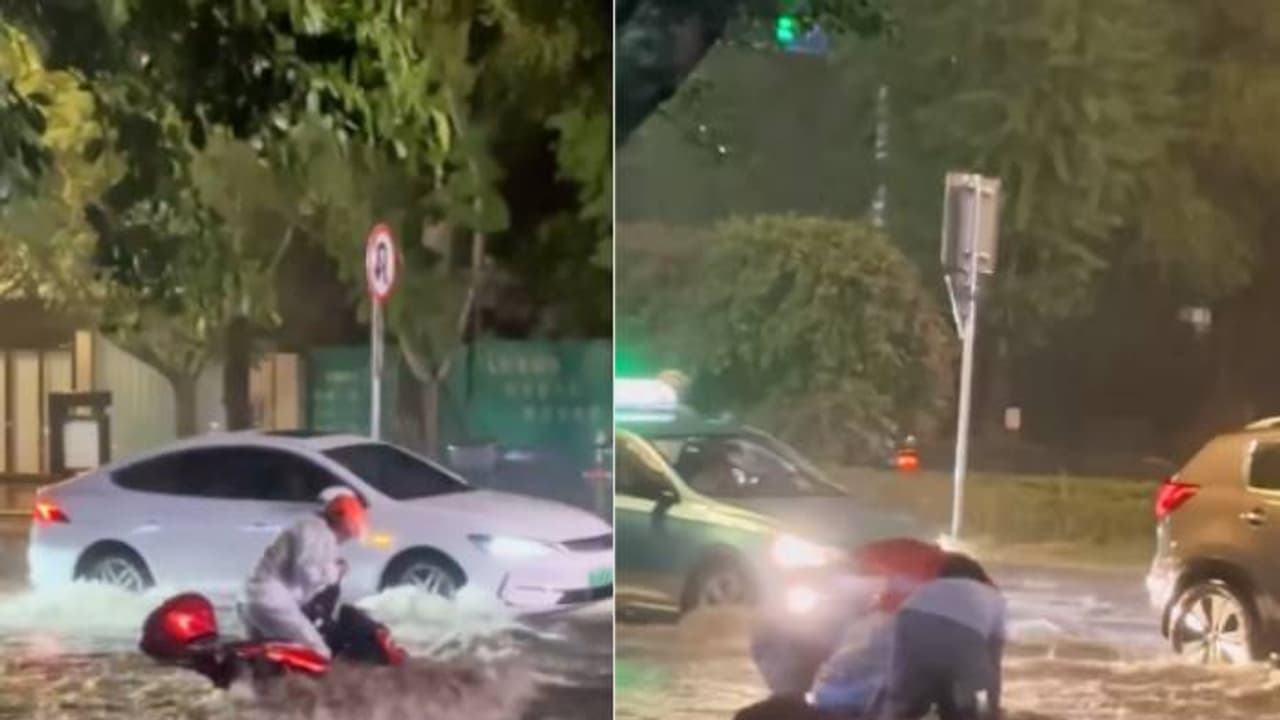 'ഇത് കാണുമ്പോൾ തോന്നുന്നു മനുഷ്യത്വം മരിച്ചിട്ടില്ല'; ഒഴുക്കിൽ പെട്ട് സ്കൂട്ടർ, കൈത്താങ്ങുമായി യുവാക്കള്‍