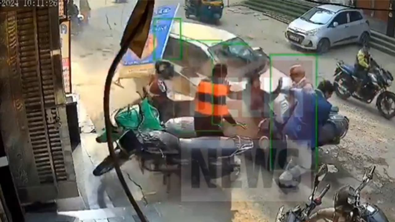 Caught on camera: Car driven by 17 year old drags man, his grandson under it in Delhi (WATCH)