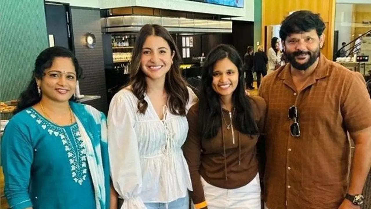 Border Gavaskar Trophy: Anushka Sharma poses with Nitish Kumar Reddy's family at Melbourne Cricket Ground Border Gavaskar Trophy: Anushka Sharma poses with Nitish Kumar Reddy's family at Melbourne Cricket Ground