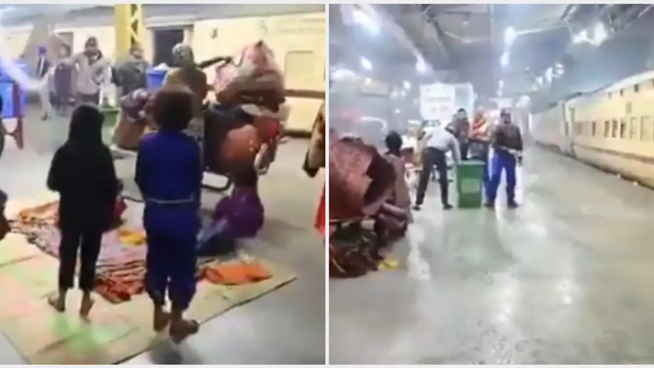തണുപ്പത്ത് പ്ലാറ്റ്ഫോമിൽ മൂടിപ്പുതച്ച് ഉറങ്ങുന്നവർക്ക് അരികിലേയ്ക്ക് വെള്ളമൊഴിച്ച് ശുചീകരണ തൊഴിലാളികൾ; വീഡിയോ