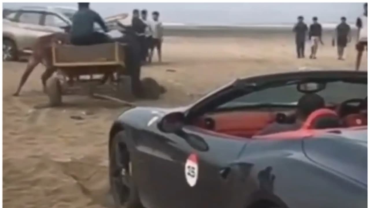 വിലക്ക് വകവെയ്ക്കാതെ ഫെറാരി ബീച്ചിലിറക്കി, കുടുങ്ങി; ഒടുവിൽ രക്ഷപ്പെടുത്താൻ നാട്ടുകാർ കൊണ്ടുവന്നത് കാളവണ്ടി