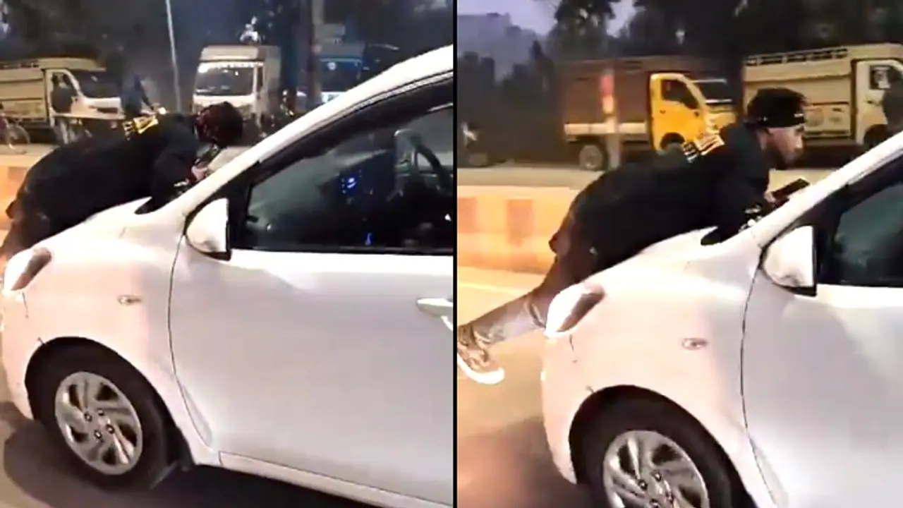 Dramatic VIDEO: UP man confronts wife's lover, clings to car bonnet for 1 km on Agra Moradabad highway [WATCH]