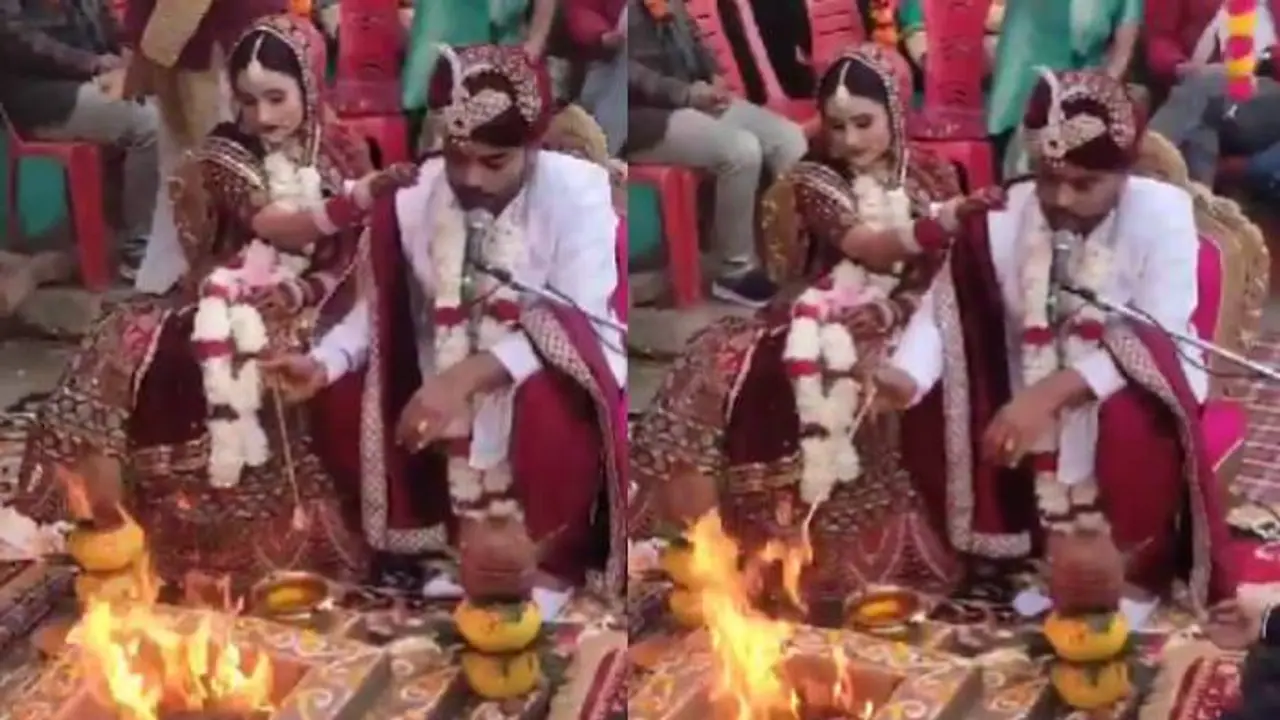 സ്വന്തം വിവാഹത്തിന് മന്ത്രങ്ങൾ ചൊല്ലി, പുരോഹിതനായി വരൻ, അമ്പരന്ന് വധുവും ബന്ധുക്കളും, വൈറലായി വീഡിയോ സ്വന്തം വിവാഹത്തിന് മന്ത്രങ്ങൾ ചൊല്ലി, പുരോഹിതനായി വരൻ, അമ്പരന്ന് വധുവും ബന്ധുക്കളും, വൈറലായി വീഡിയോ