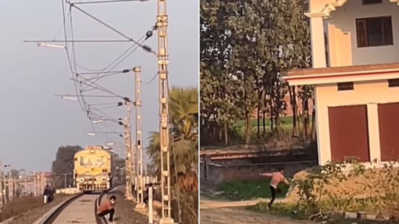 UP: Loco-pilot stops train just in time to save man sitting on tracks, distracted by mobile (WATCH)