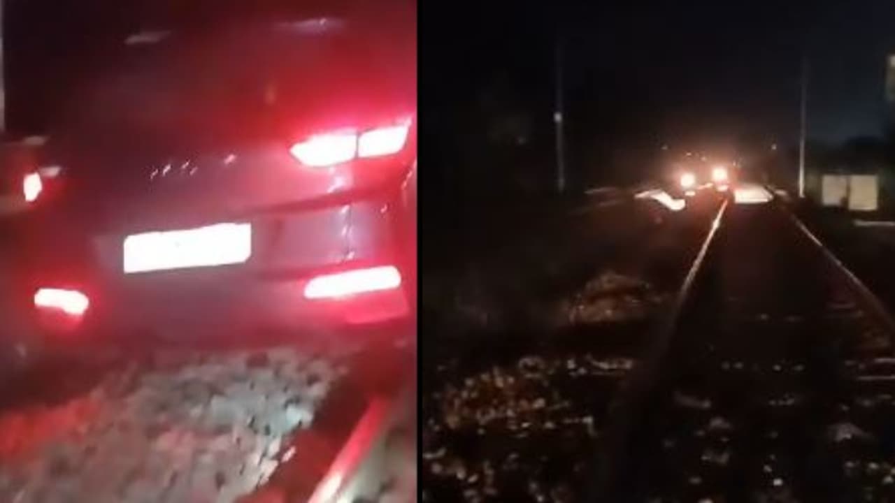 'ഇത്തിരി സ്പീഡ് കൂടിപ്പോയി', മദ്യപിച്ച് ഫിറ്റായി കാർ റെയിൽവേ ട്രാക്കിലേക്ക് ഓടിച്ച് കയറ്റി ദമ്പതികൾ
