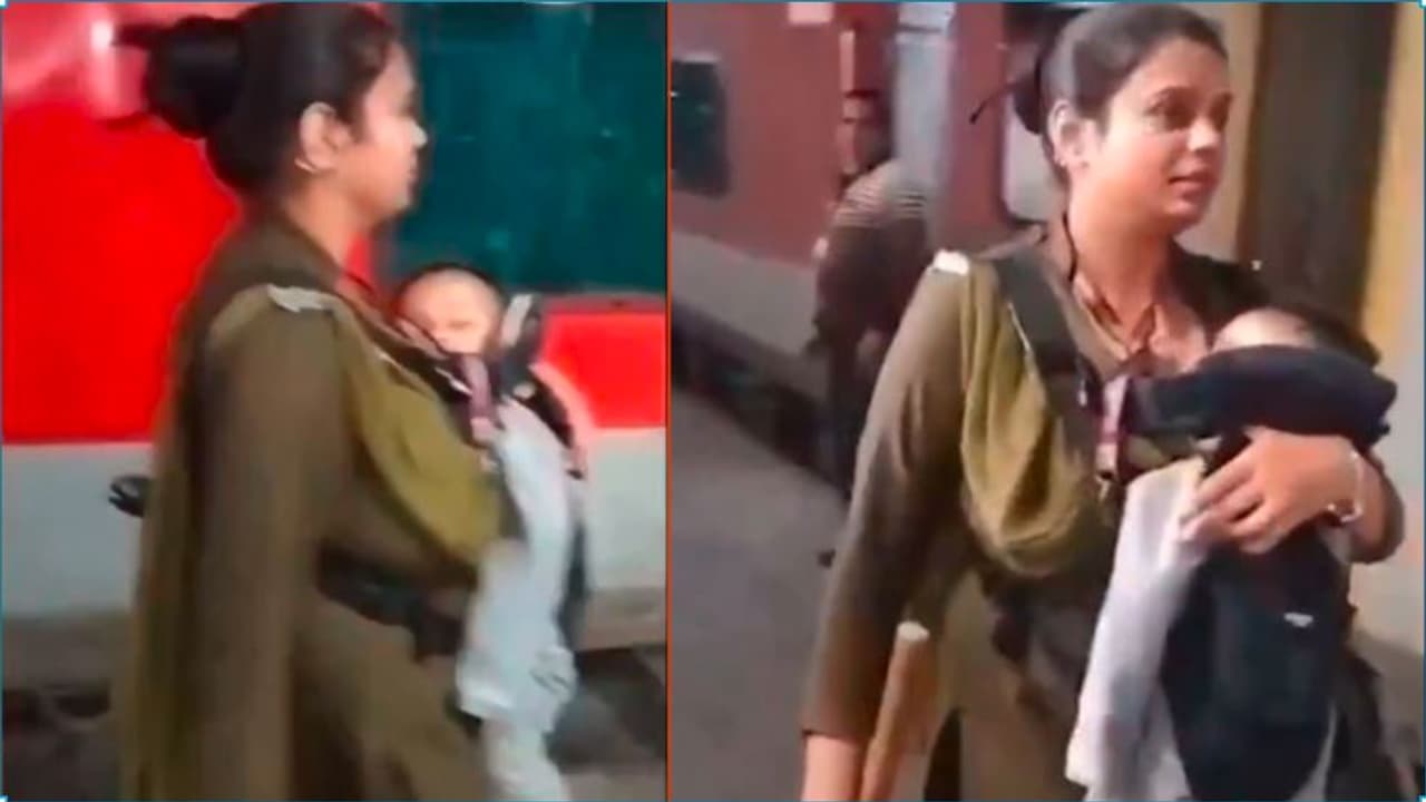 ಮಗು ಎತ್ತಿಕೊಂಡೇ ದೆಹಲಿ ರೈಲು ನಿಲ್ದಾಣದಲ್ಲಿ ಮಹಿಳಾ ಆರ್‌ಪಿಎಫ್ ಸಿಬ್ಬಂದಿ ಸೇವೆ: ವೀಡಿಯೋ ವೈರಲ್