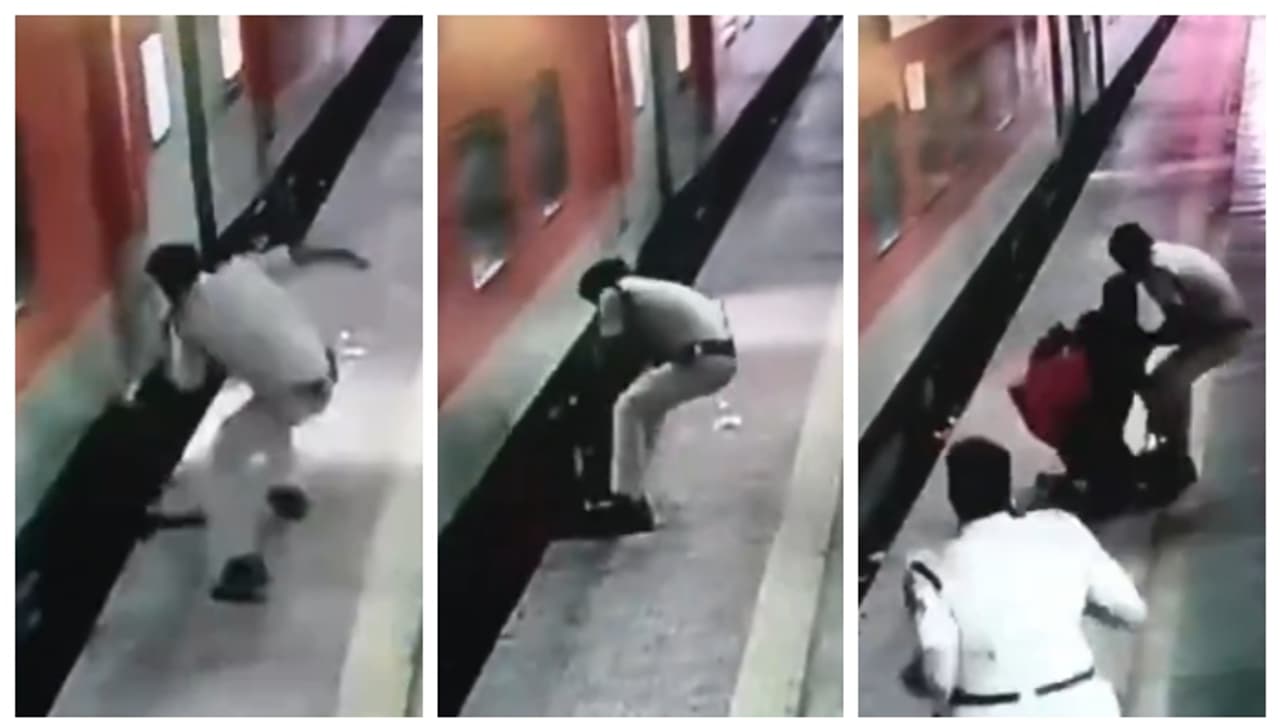 ഓടിത്തുടങ്ങിയ ട്രെയിനിൽ കയറാനുള്ള ശ്രമത്തിനിടെ പിടിവിട്ടു, നേരെ ട്രാക്കിലേക്ക്; അത്ഭുതകരമായ രക്ഷപ്പെടൽ വീഡിയോ