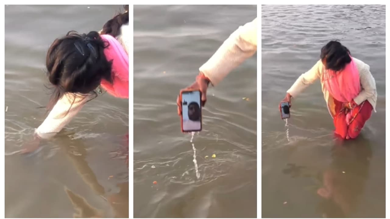കുഭമേളയ്ക്കെത്തിയ ഭാര്യയെ വീഡിയോ കോൾ ചെയ്ത് ഭർത്താവ്, ഫോൺ ഗംഗയിൽ മുക്കി പുണ്യസ്നാനം നടത്തി ഭാര്യ; വീഡിയോ വൈറൽ