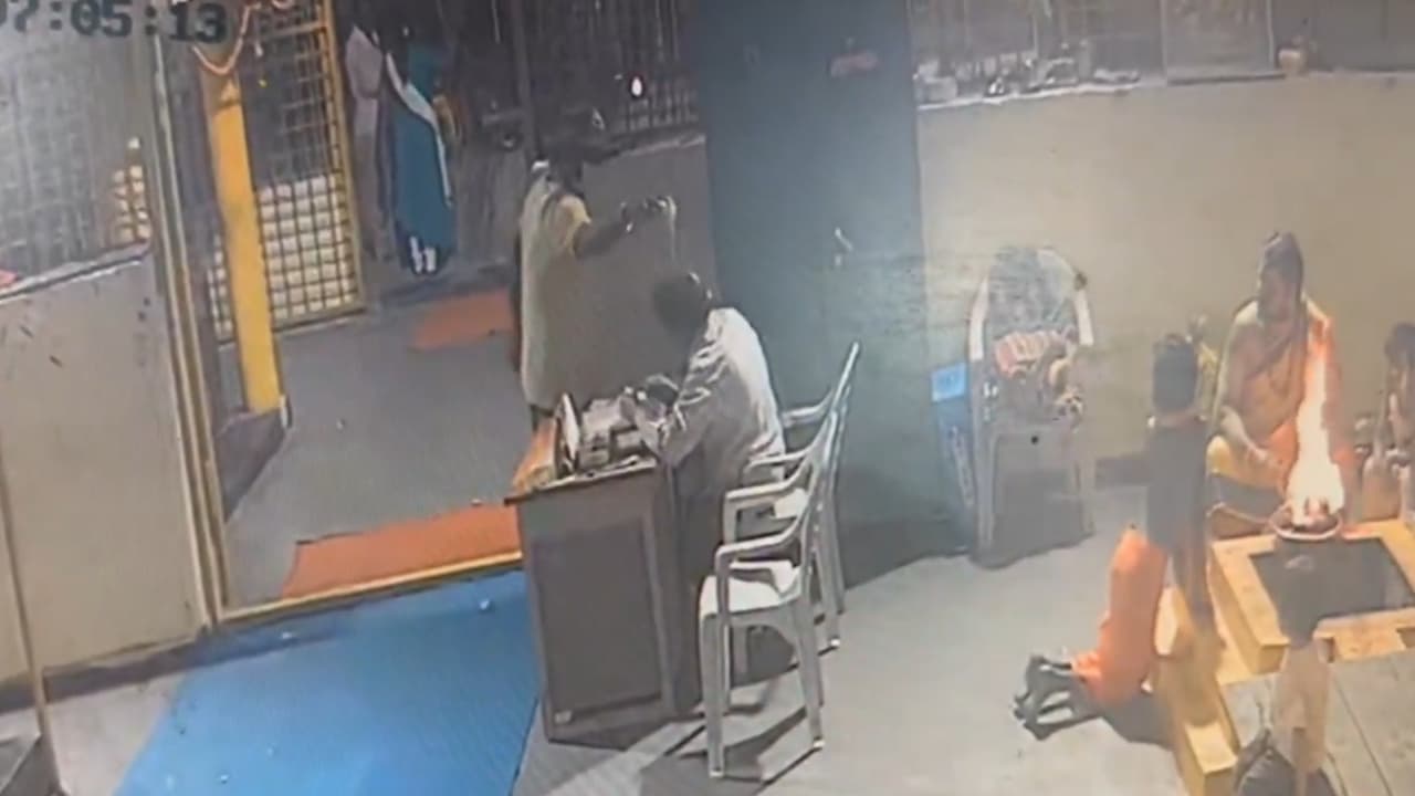 On CCTV, Telangana temple accountant suffers burn injuries after acid attack by unidentified man (WATCH)