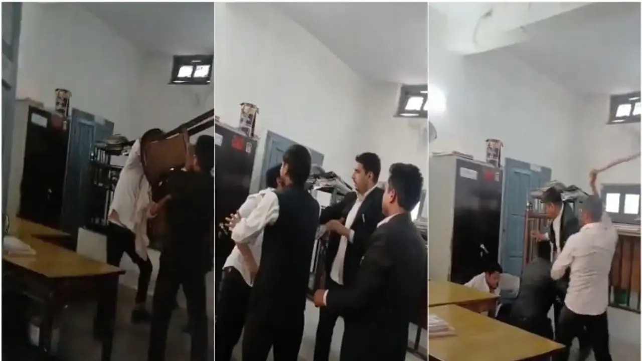 Stick, chair, chaos: Lawyers brawl in UP's Jhansi courtroom over client dispute (WATCH) Stick, chair, chaos: Lawyers brawl in UP's Jhansi courtroom over client dispute (WATCH)