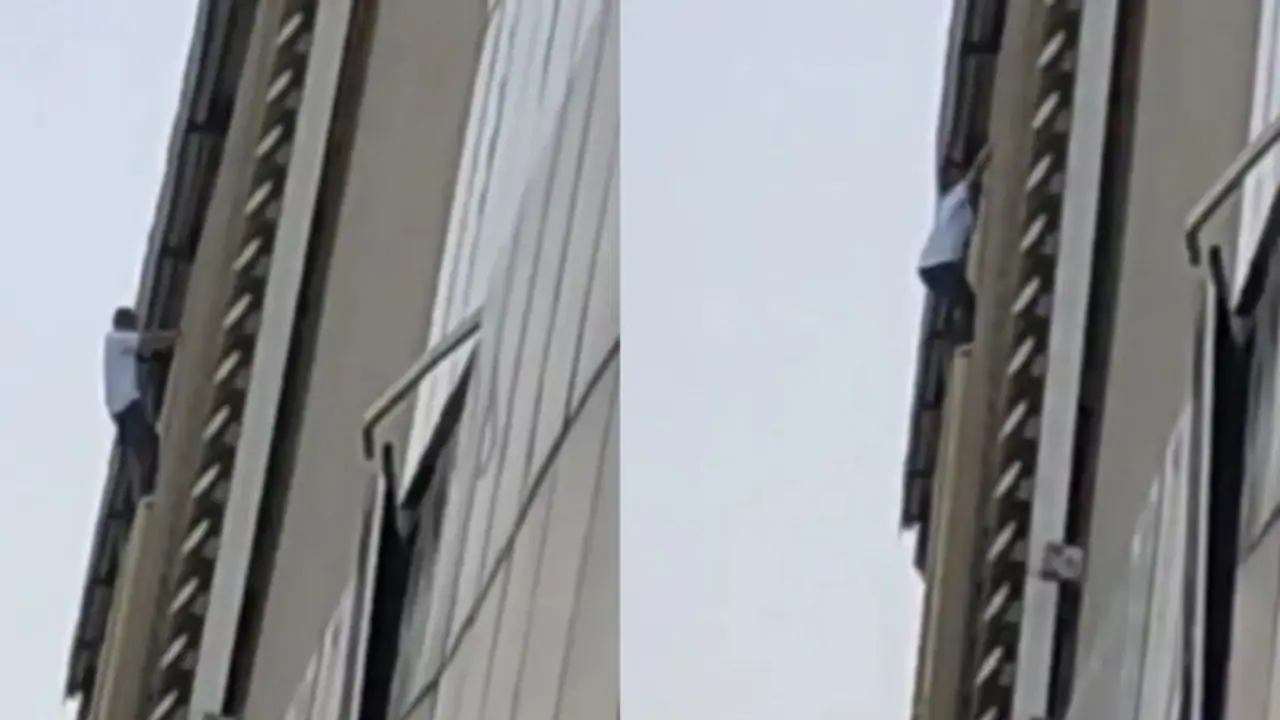 Delhi: Man seen dangling from Mayur Vihar metro station, jumps, hospitalised in critical condition (WATCH) Delhi: Man seen dangling from Mayur Vihar metro station, jumps, hospitalised in critical condition (WATCH)