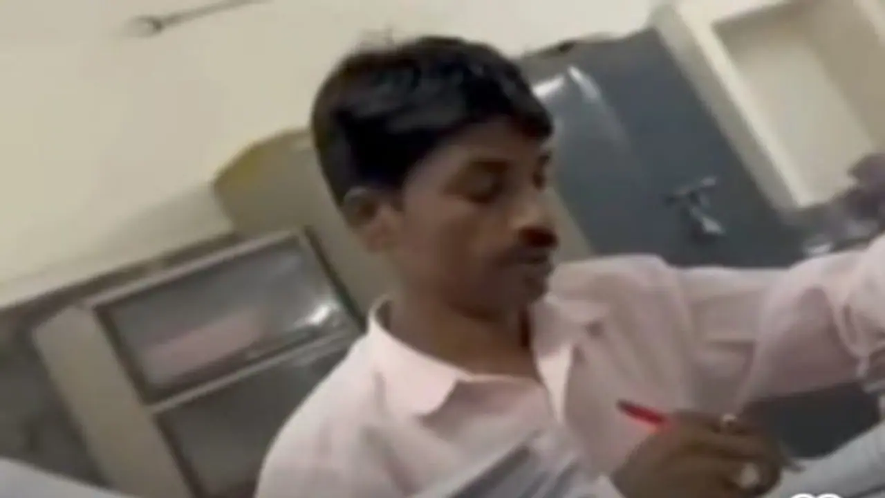 Madhya Pradesh peon checks university papers in professor's absence, gets Rs 5,000, video goes viral (WATCH)