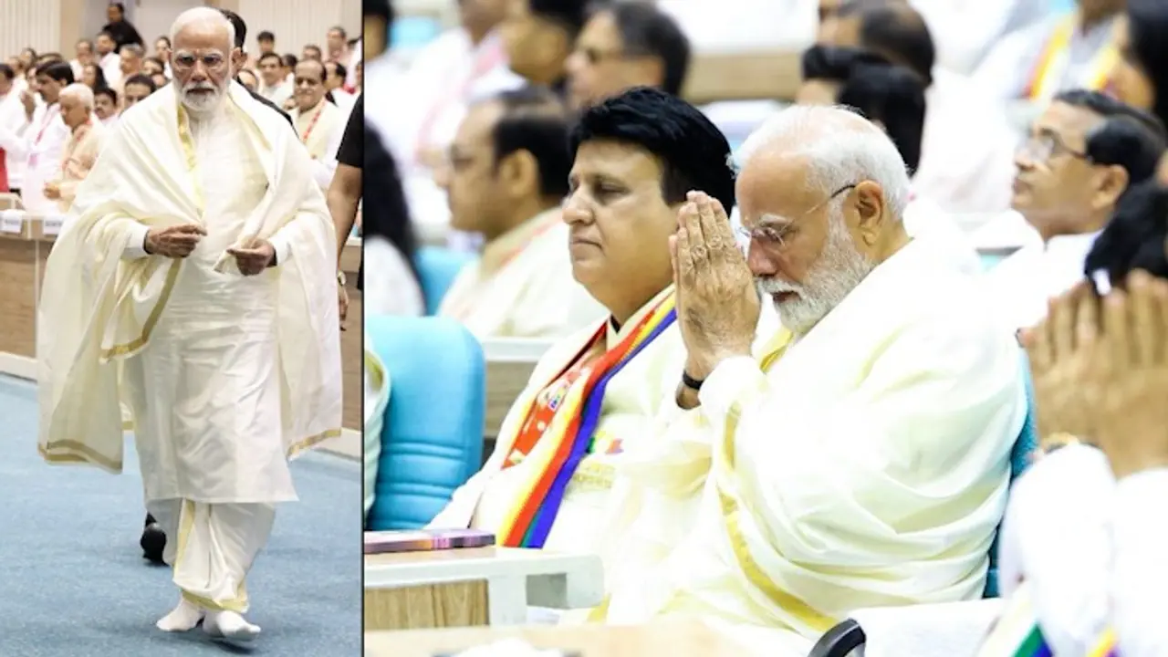 PM Modi attends Navkar Mahamantra Divas barefoot, sits among devotees; See PICS PM Modi attends Navkar Mahamantra Divas barefoot, sits among devotees; See PICS