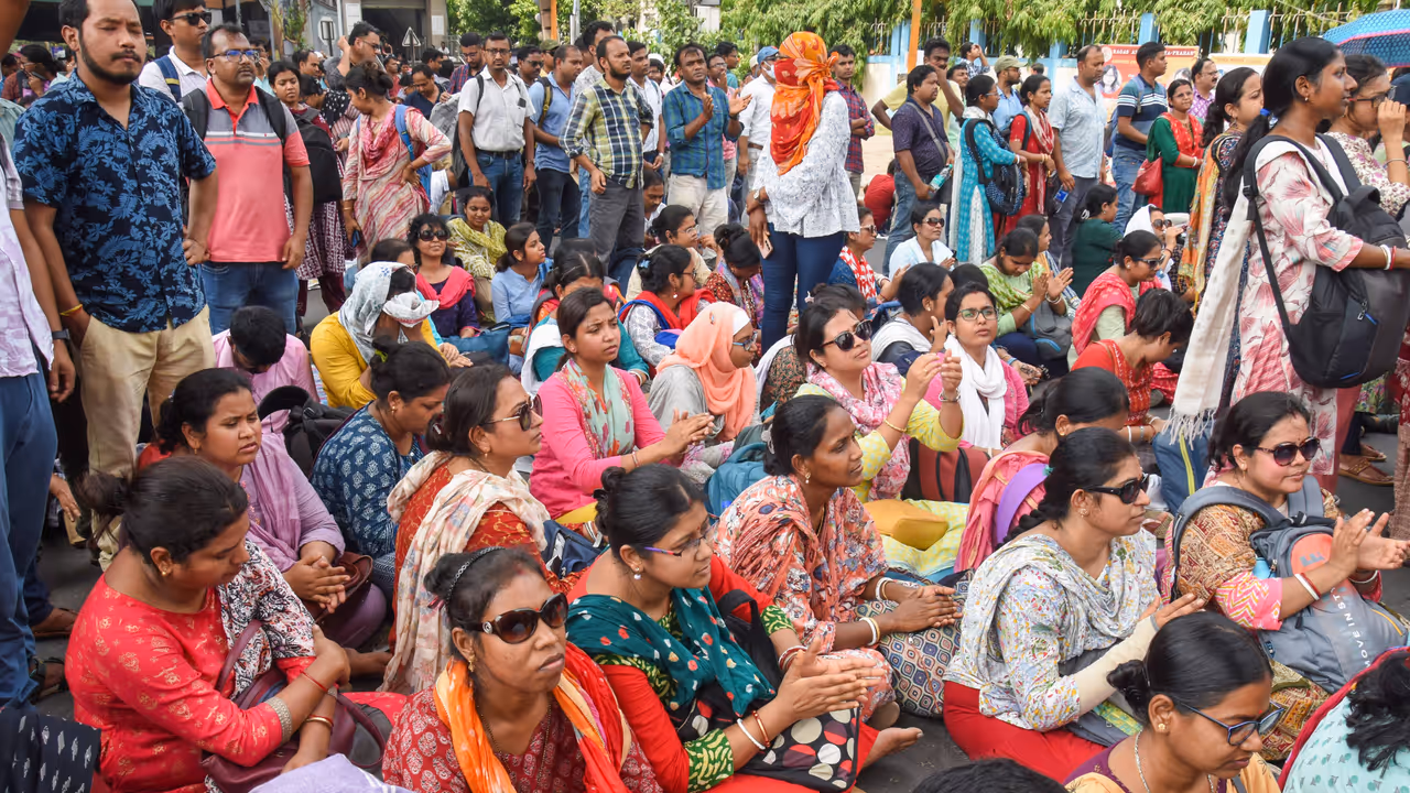 Teachers stage a sit in protest outside SSC office Teachers stage a sit in protest outside SSC office