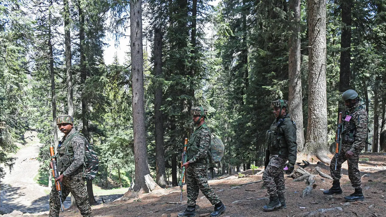 Security personnel carry out a search operation at Baisaran following the Pahalgam terrorist attack