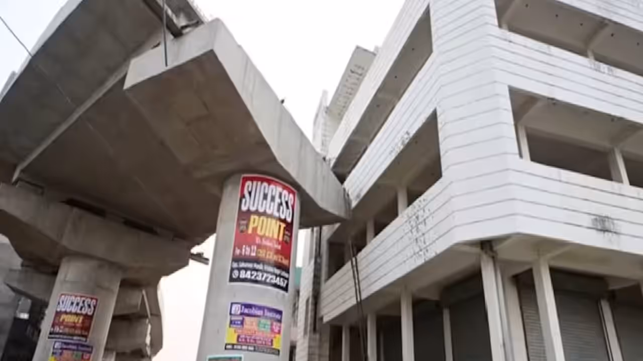 lucknow railway overbridge construction halted compensation dispute