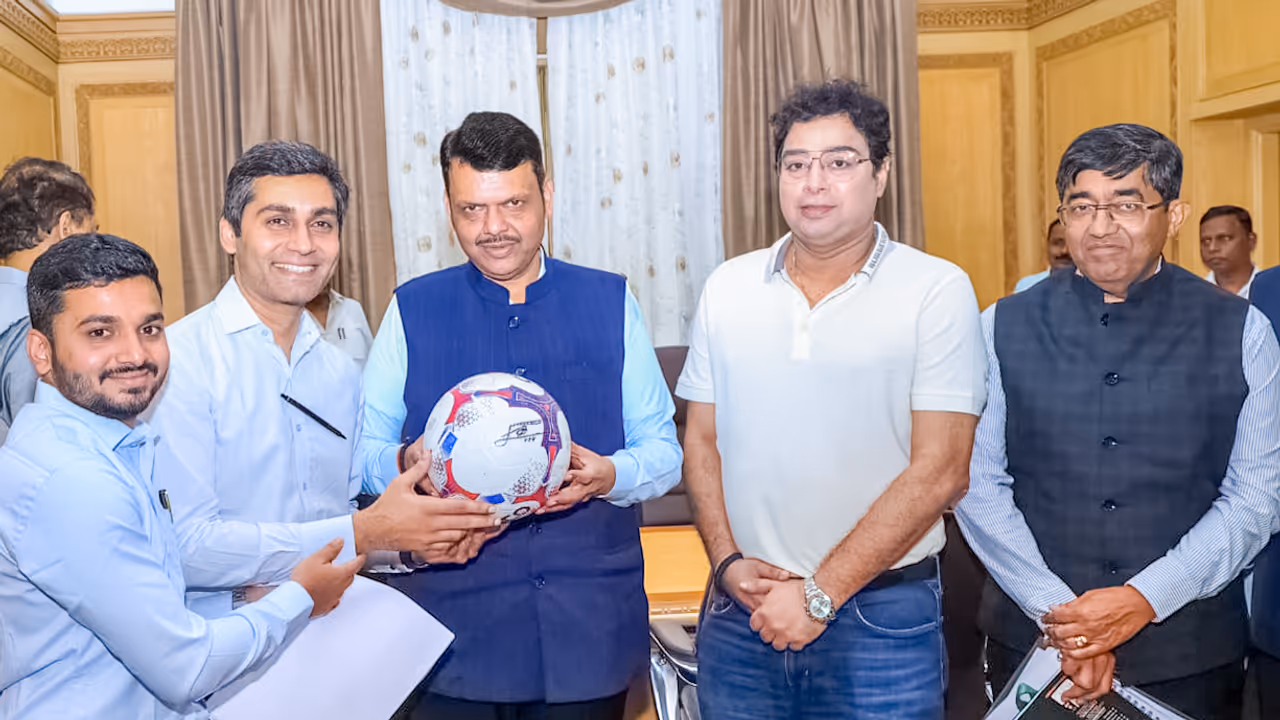 Devendra Fadnavis with Football Signed by Lionel Messi