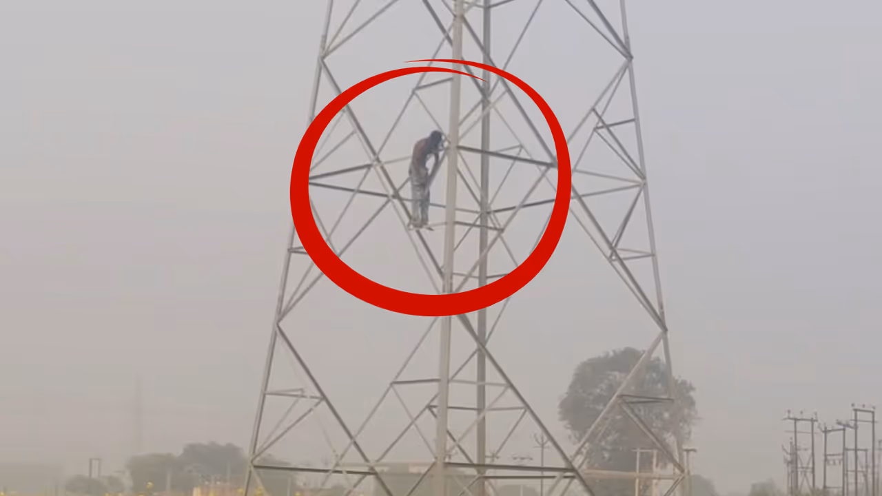 varanasi lover climbs 11000 volt high tension tower varanasi lover climbs 11000 volt high tension tower
