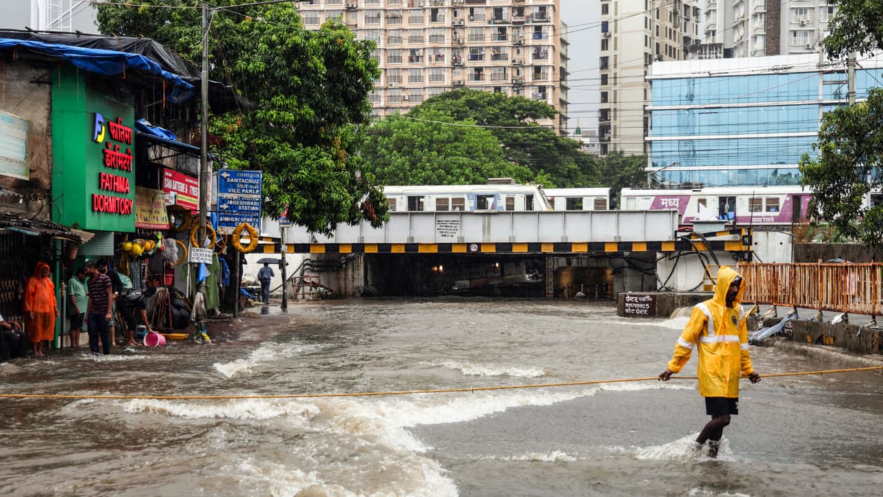 mumbai heavy rain high tide alert waterlogging panvel slab collapse maharashtra monsoon 2026 mumbai heavy rain high tide alert waterlogging panvel slab collapse maharashtra monsoon 2026