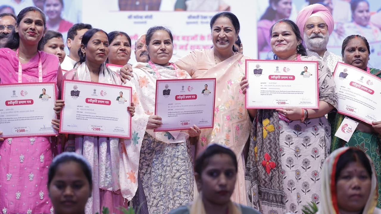 Rekha Gupta Launches Delhi Lakshmi Yojana, First 2,500 Women Receive Approval Letters Rekha Gupta Launches Delhi Lakshmi Yojana, First 2,500 Women Receive Approval Letters
