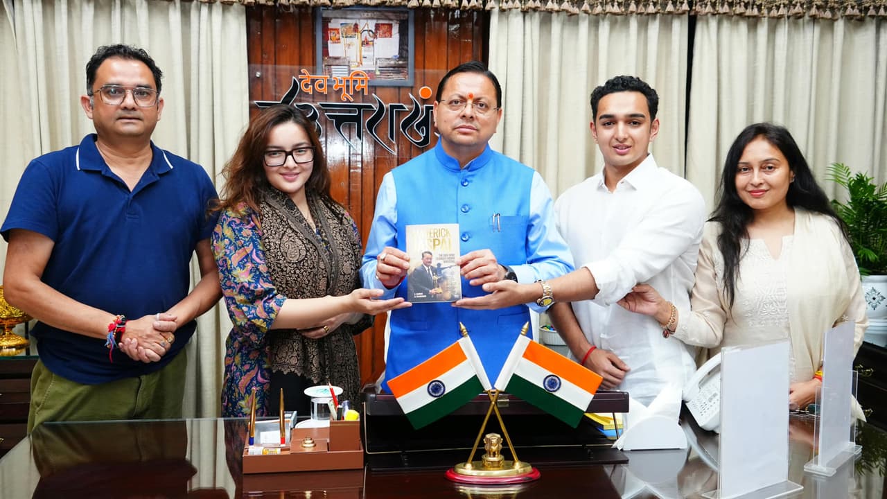 CM Pushkar Singh Dhami Unveils ‘Maverick Jaspal’ Book On Shooting Legend Jaspal Rana CM Pushkar Singh Dhami Unveils ‘Maverick Jaspal’ Book On Shooting Legend Jaspal Rana