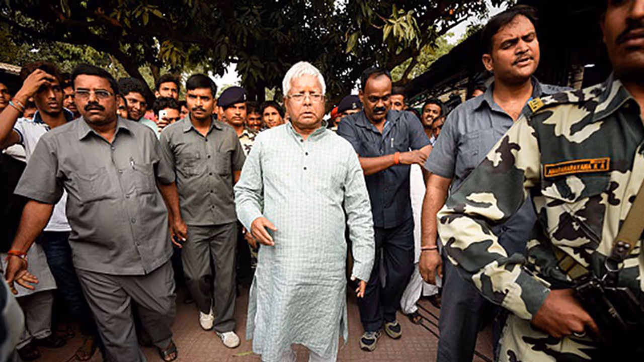 I T raids 22 properties linked to Lalu Prasad on charges of benami land deals I T raids 22 properties linked to Lalu Prasad on charges of benami land deals