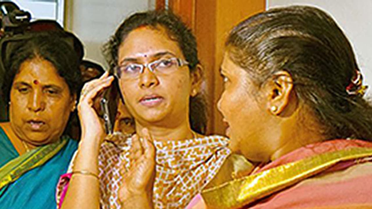 Ex MLA’s wife sits on dharna, accuses him of assaulting her Ex MLA’s wife sits on dharna, accuses him of assaulting her