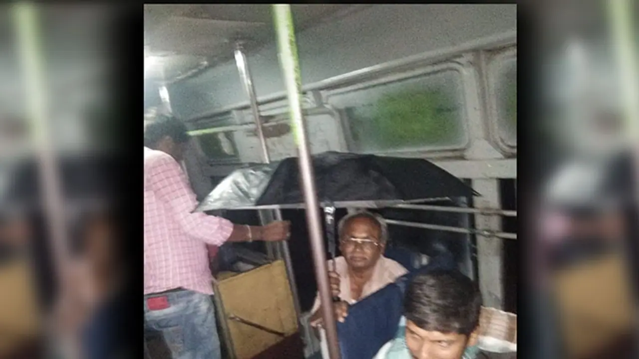 Heavy rains: People forced to open umbrellas inside public bus in Hosur [Pics]