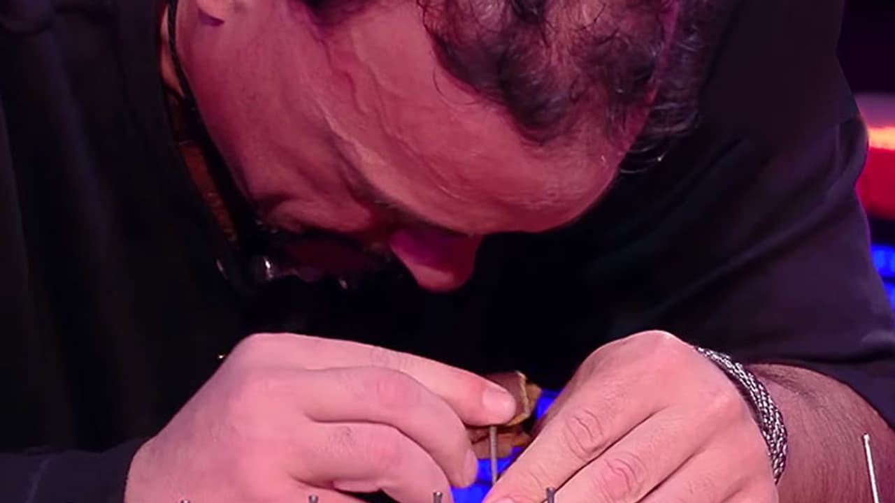 Nailed it: Man uses head to bash in nails onto a wooden board in record time