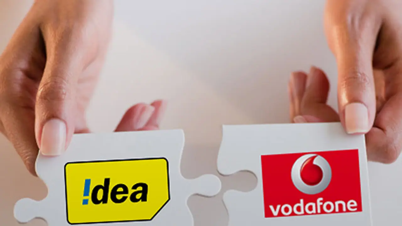 Telecom juggernaut: Vodafone Idea shake hands over Rs 80,000 crore Telecom juggernaut: Vodafone Idea shake hands over Rs 80,000 crore
