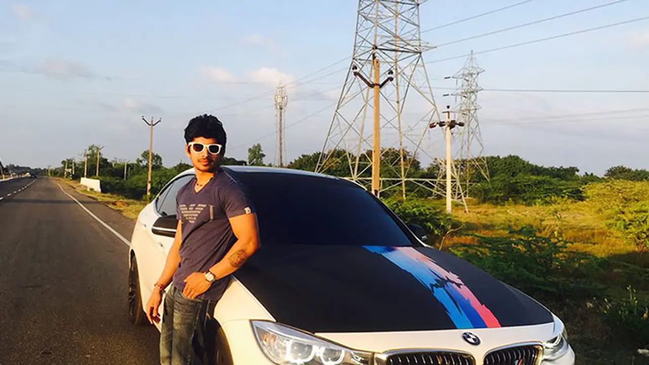Racer Ashwin Sundar, wife burnt to death after BMW caught fire Racer Ashwin Sundar, wife burnt to death after BMW caught fire