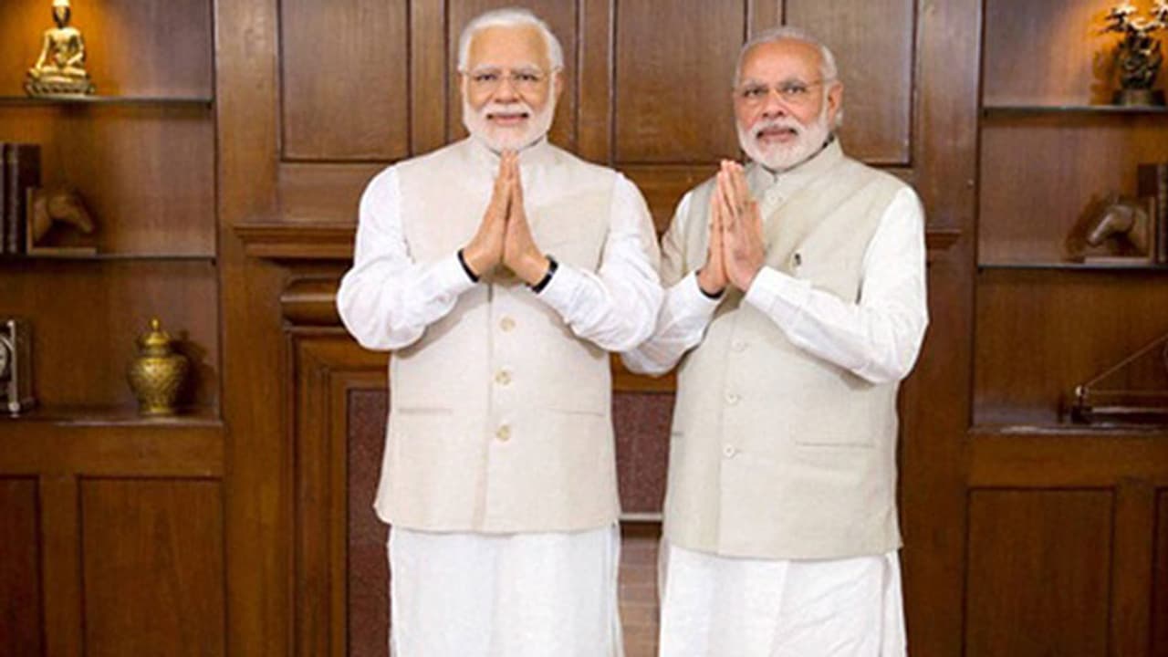 Narendra Modi met another Narendra Modi, waxed version Narendra Modi met another Narendra Modi, waxed version