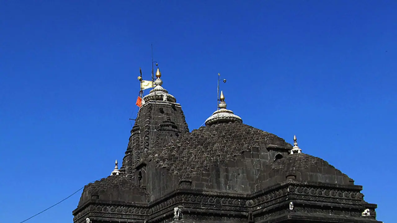 Trimbakeshwar revokes its ban on men's entry in sanctum Trimbakeshwar revokes its ban on men's entry in sanctum