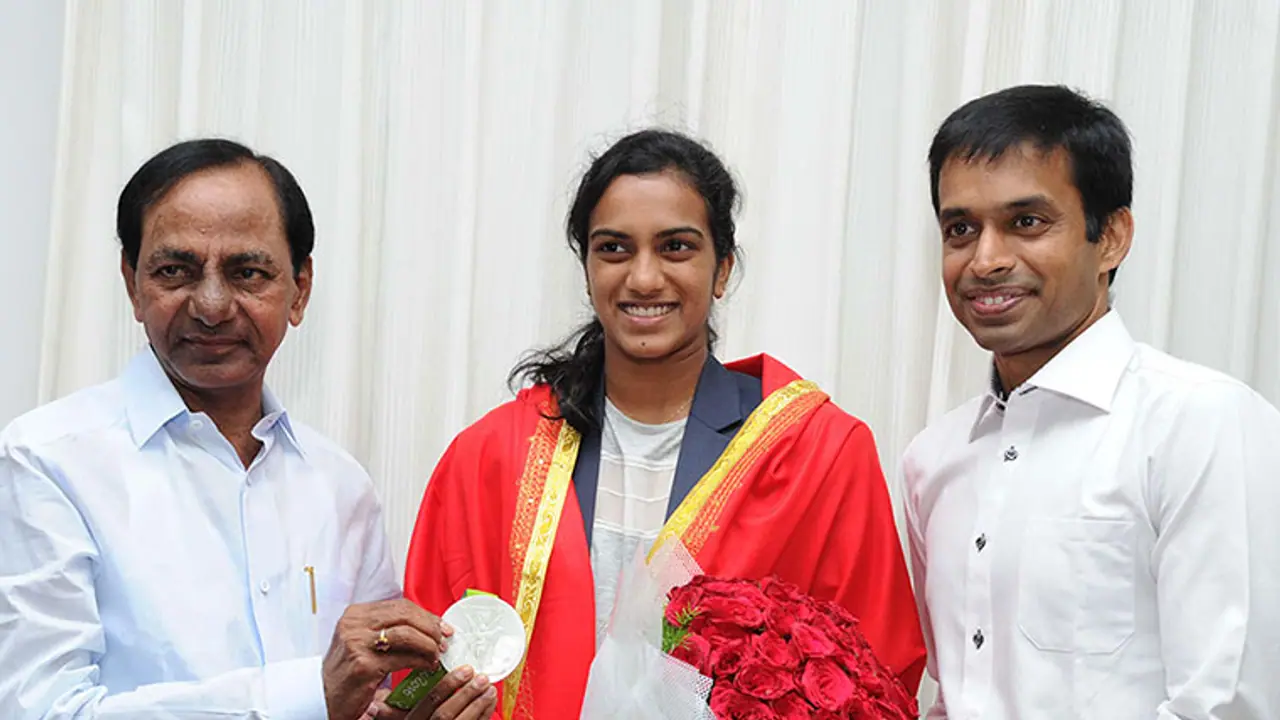 KCR gifts Sindhu ₹5 crore, promises new sports policy KCR gifts Sindhu ₹5 crore, promises new sports policy