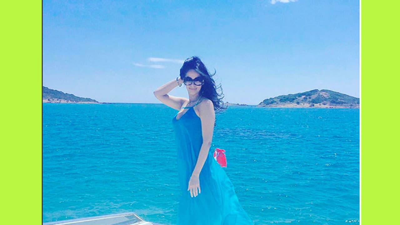 Holiday or honeymoon? Mallika Sherawat lounges in Corsica Holiday or honeymoon? Mallika Sherawat lounges in Corsica