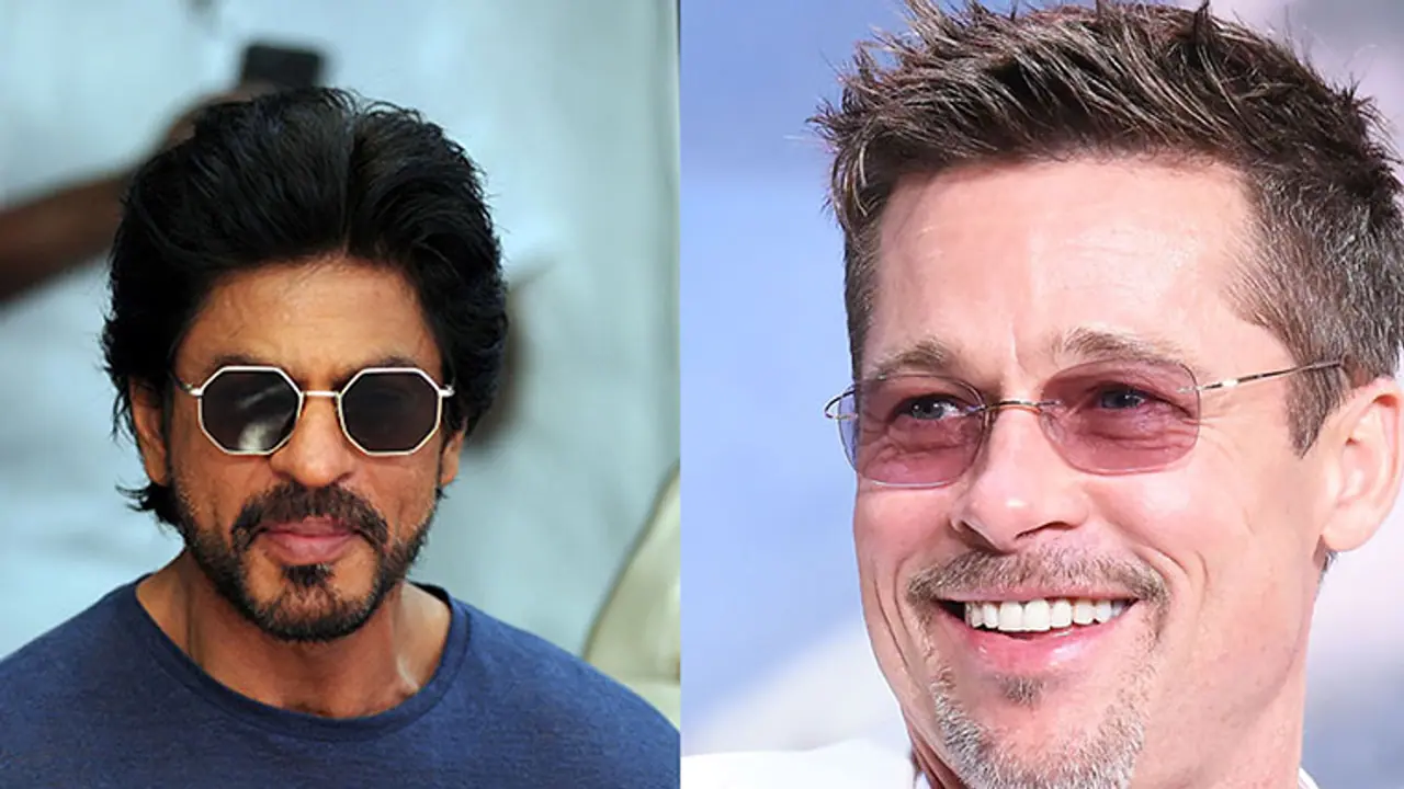 In Pics: SRK and Brad Pitt share a platform for the first time In Pics: SRK and Brad Pitt share a platform for the first time
