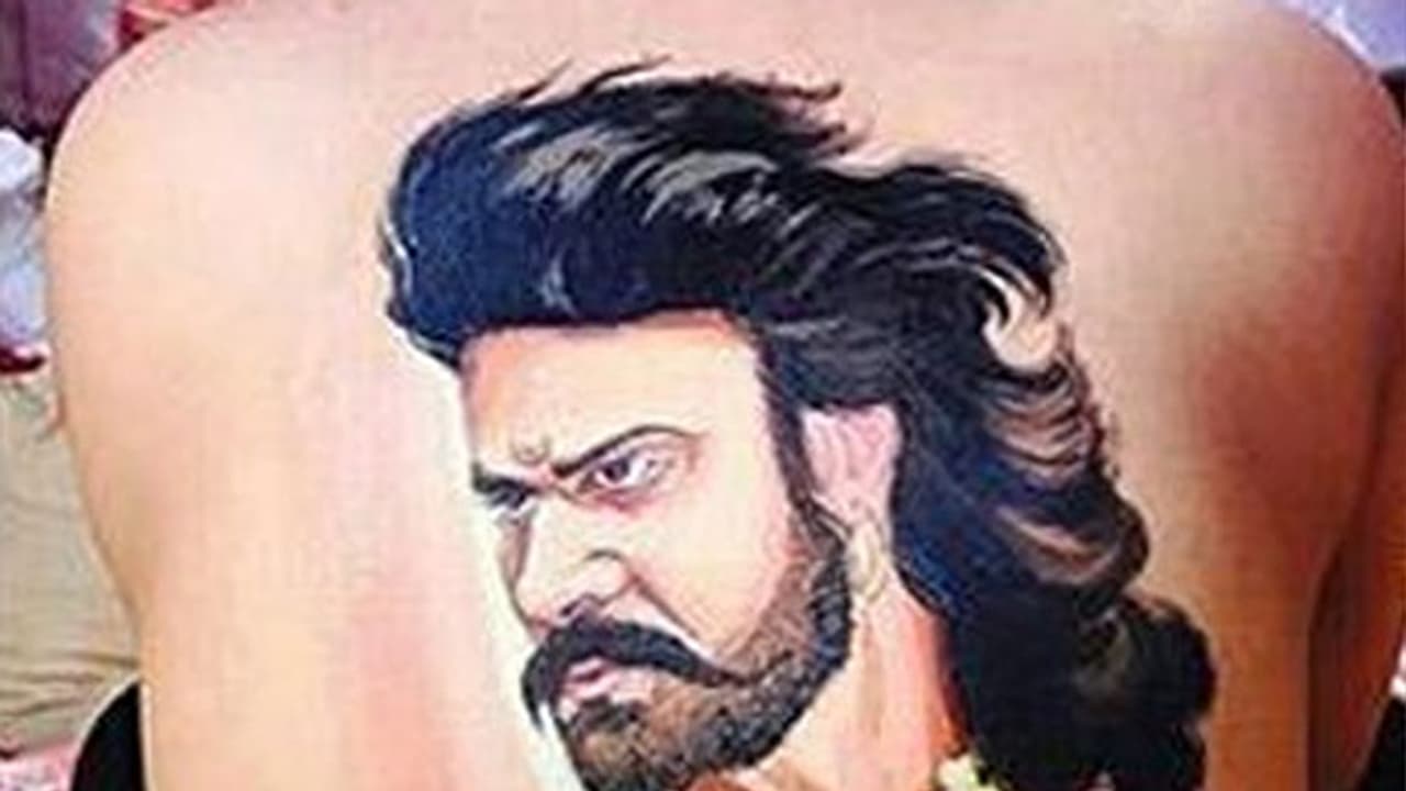 Here is why Prabhas shared this female Baahubali fan's bare back pictures Here is why Prabhas shared this female Baahubali fan's bare back pictures