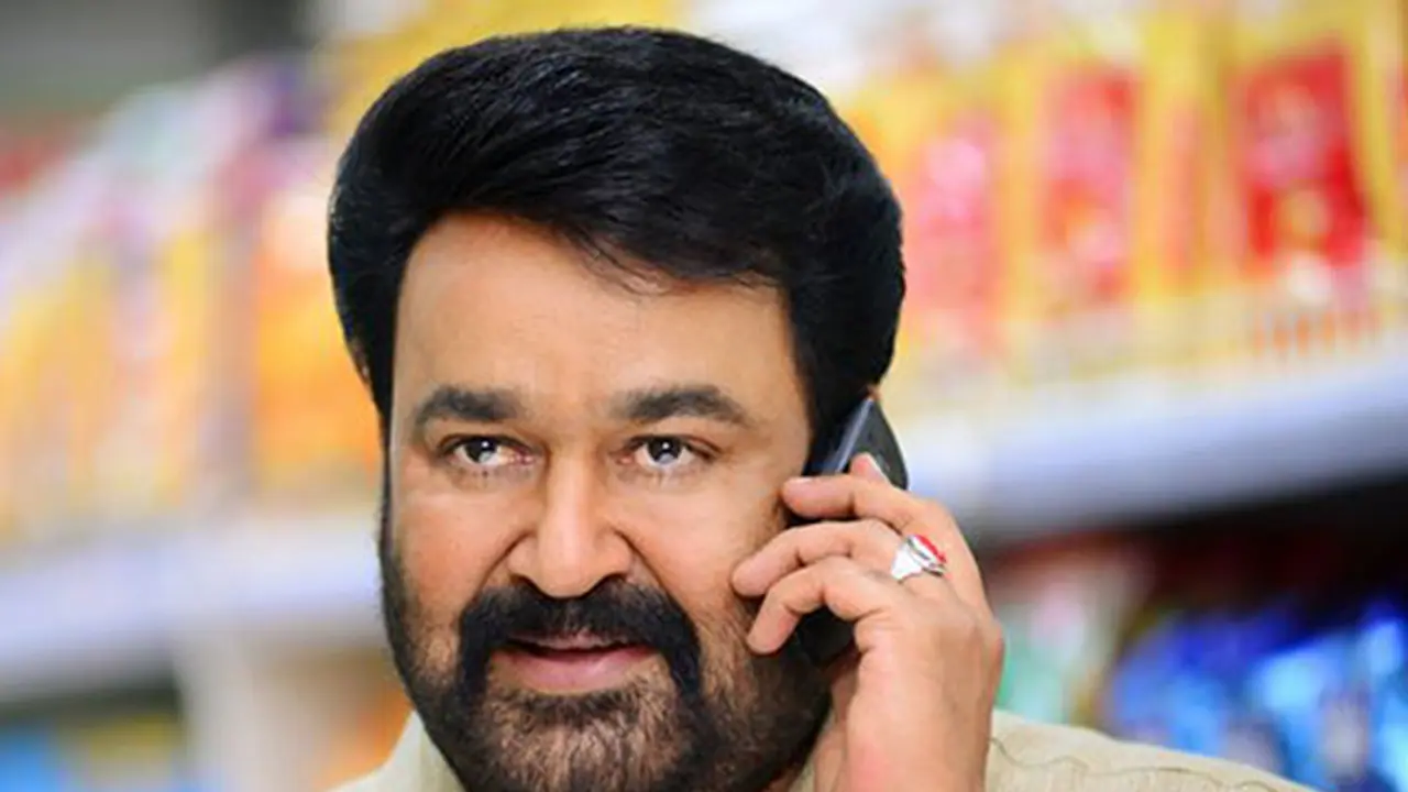 "My phone number is..." Guess what this Mohanal fan's car registration plate reads "My phone number is..." Guess what this Mohanal fan's car registration plate reads