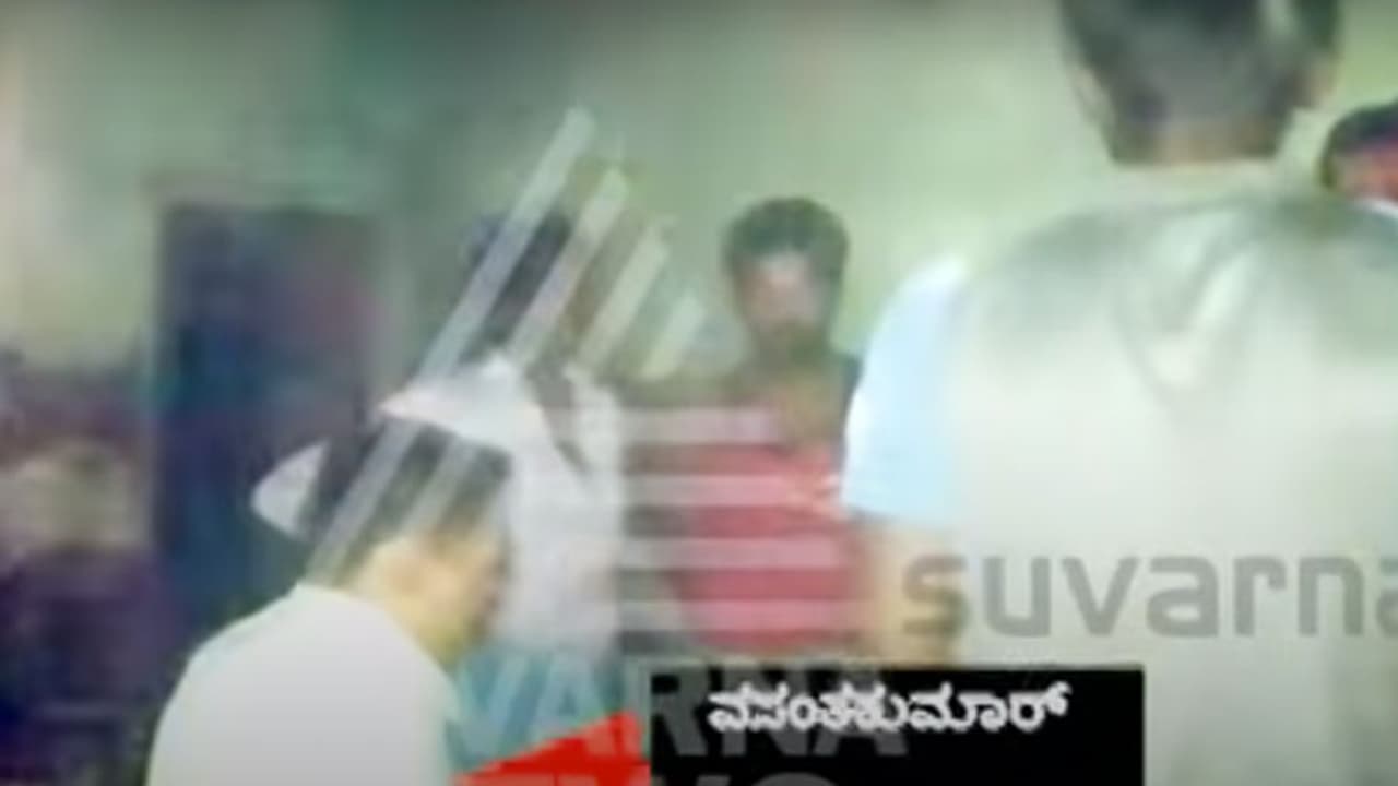 Caught on cam: Woman thrashes Excise inspector Caught on cam: Woman thrashes Excise inspector