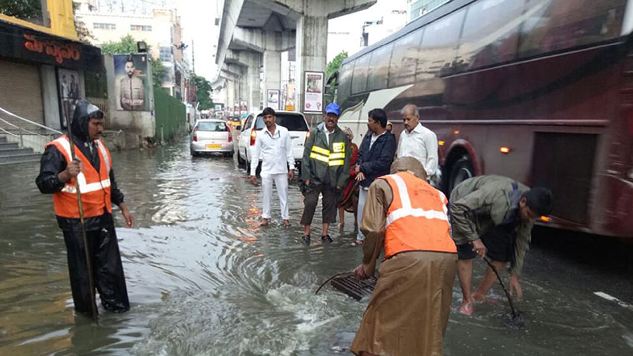 Heavy rains disrupt life in Hyderabad, damaging roads Heavy rains disrupt life in Hyderabad, damaging roads