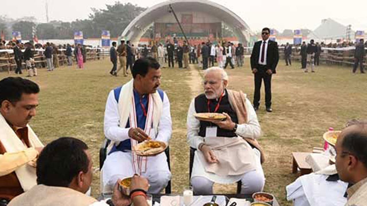 PM Modi shares home cooked lunch box with party workers PM Modi shares home cooked lunch box with party workers