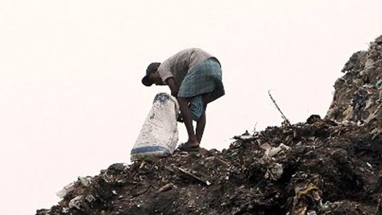50 foot garbage heap buries woman, daughter 50 foot garbage heap buries woman, daughter