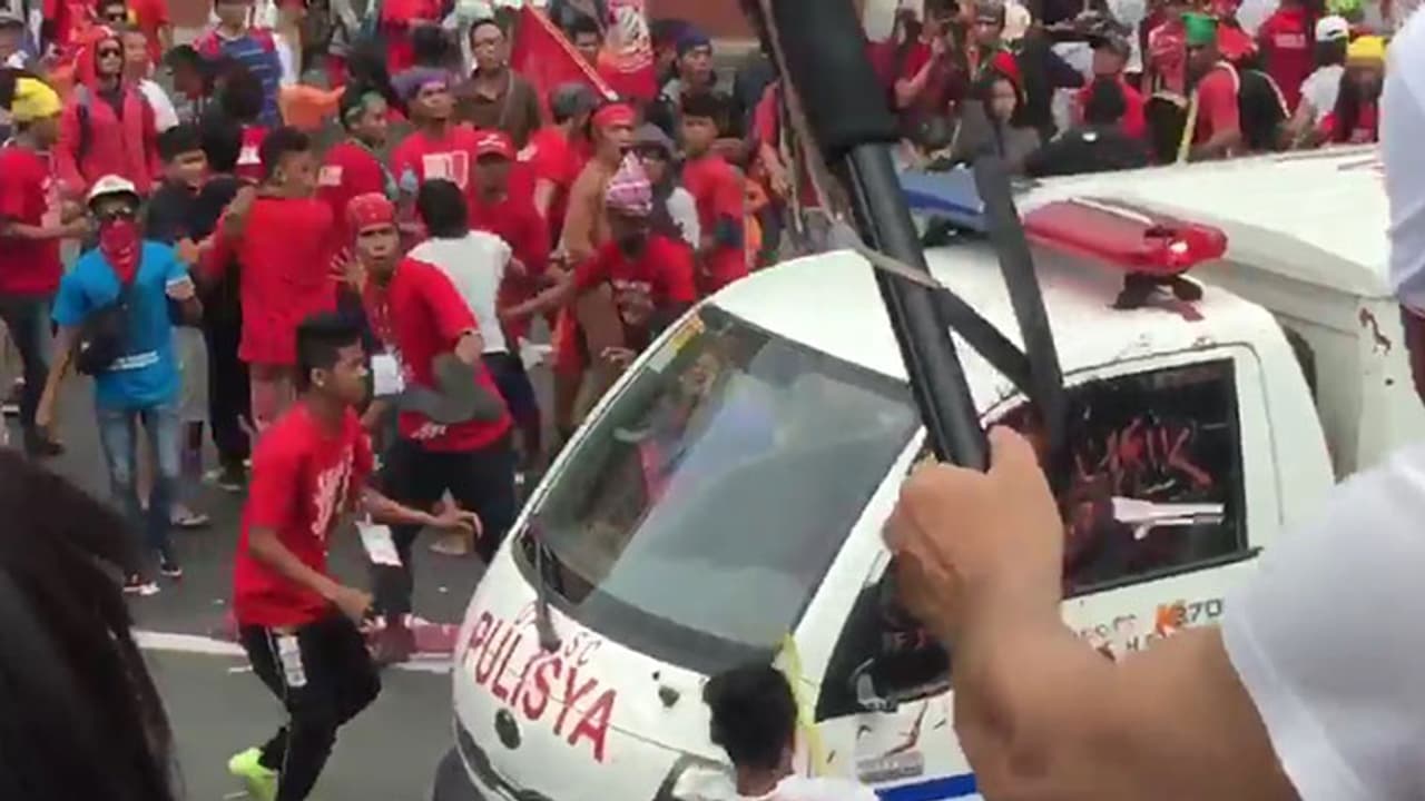 Video: Police van runs over woman in Philippines during protest Video: Police van runs over woman in Philippines during protest