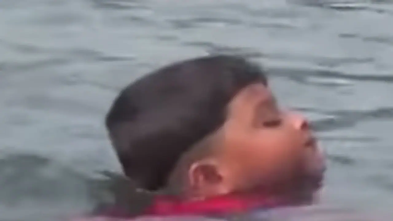 Five year old swim across Kerala's longest river Five year old swim across Kerala's longest river
